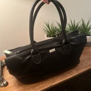 PERLINA Leather Black hand bag